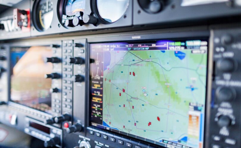 close up of a navigation system in a flight cockpit